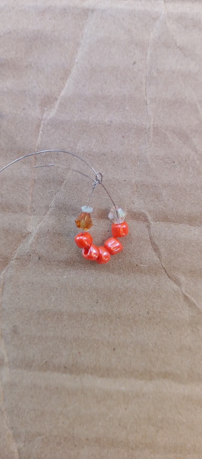 Accessories, Earring, Jewelry, Bead, Gemstone, Necklace, Ornament, Food, Produce, Fruit, Plant, Bead Necklace, Sweets, Box, Prayer, Prayer Beads, Coil, Spiral, Agate, Cardboard, Weapon, Bracelet, Sphere, Pepper, Vegetable, Crystal, Carton, Leaf, Maple, Tree, Silver, Candy, Wood