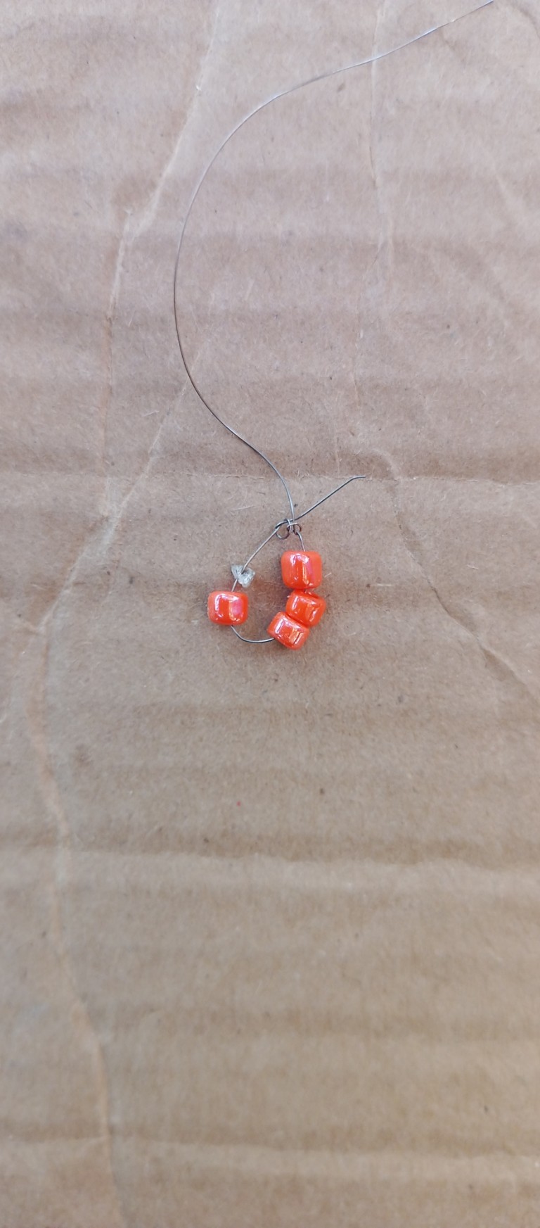 Accessories, Earring, Jewelry, Bead, Necklace, Gemstone, Ornament, Pendant, Cardboard, Weapon, Prayer, Prayer Beads, Box, Food, Produce, Silver, Dice, Game, Carton, Fruit, Plant, Bead Necklace, Sphere, Coil, Spiral, Agate, Collar, Floor, Flooring, Animal, Invertebrate, Spider, Medication