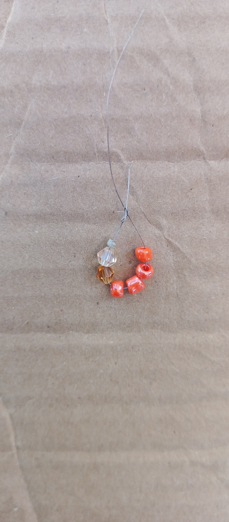 Accessories, Earring, Jewelry, Necklace, Gemstone, Bead, Ornament, Leaf, Plant, Bead Necklace, Diamond, Food, Produce, Crystal, Box, Sweets, Pendant, Cardboard, Agate, Animal, Weapon, Prayer, Prayer Beads, Sea Life, Home Decor, Linen, Silver, Fruit, Opal, Invertebrate, Seashell, Cross, Symbol, Coil, Spiral, Seafood, Floor, Spider, Pattern, Maple, Tree, Collar, Balloon, Carton, Bracelet, Aluminium, Flooring, Rock, Coin, Money